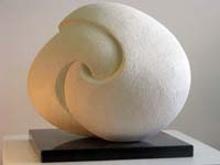 Abstract sculpture carved in limestone entitled 'Destiny'